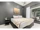 Charming bedroom with stylish decor, cozy bed, and a tranquil, relaxing atmosphere at 21 W Beryl Ave, Phoenix, AZ 85021