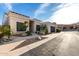 Charming single-story home with desert landscaping and a modern garage door under a blue sky at 21 W Beryl Ave, Phoenix, AZ 85021