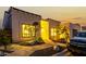 Attractive single-story home with desert landscaping and a paved walkway at twilight at 21 W Beryl Ave, Phoenix, AZ 85021