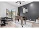 Versatile game room with a foosball table, a desk, and a large window for natural light at 21 W Beryl Ave, Phoenix, AZ 85021