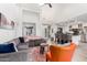 Open-concept living area with a view of the kitchen, vaulted ceilings, and ample seating at 21 W Beryl Ave, Phoenix, AZ 85021