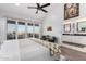 Sun-filled main bedroom boasts mountain views, ensuite bathroom, and neutral color palette at 21 W Beryl Ave, Phoenix, AZ 85021