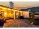 Expansive backyard patio with an outdoor dining area, cozy seating, and stunning desert mountain views at 21 W Beryl Ave, Phoenix, AZ 85021