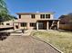 Spacious backyard featuring a built-in grill and firepit area, perfect for outdoor gatherings and relaxation at 2461 E Binner Dr, Chandler, AZ 85225