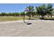 Outdoor basketball court with hoop, set in a park-like area under a bright blue sky at 2461 E Binner Dr, Chandler, AZ 85225