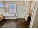 Bathroom with glass enclosed shower, soaking tub, and tile floors at 2461 E Binner Dr, Chandler, AZ 85225