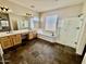 Primary bathroom featuring a soaking tub, glass enclosed shower, and dual sinks at 2461 E Binner Dr, Chandler, AZ 85225