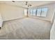 Large bedroom with carpeting and natural light from the many windows with blinds at 2461 E Binner Dr, Chandler, AZ 85225