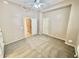Large carpeted bedroom with ample closet space and access to a hallway at 2461 E Binner Dr, Chandler, AZ 85225