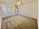 Bright bedroom with neutral carpeting and a spacious closet for maximum storage at 2461 E Binner Dr, Chandler, AZ 85225