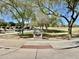 Entrance to a Gathering-friendly community park with a green lawn and a sign displaying its name at 2461 E Binner Dr, Chandler, AZ 85225