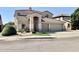 Lovely two-story home showcasing a well-kept front yard and neutral color palette at 2461 E Binner Dr, Chandler, AZ 85225