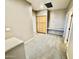 Hallway features a carpeted floor, storage cabinets, and a built-in bench providing functional and stylish space at 2461 E Binner Dr, Chandler, AZ 85225
