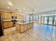 Bright kitchen with stainless steel appliances, granite countertops, and a central island at 2461 E Binner Dr, Chandler, AZ 85225