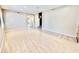 Expansive living room featuring modern laminate flooring and neutral color palette at 2461 E Binner Dr, Chandler, AZ 85225