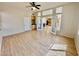 Open living area showcasing French doors, a wet bar, and access to other rooms with lots of natural light at 2461 E Binner Dr, Chandler, AZ 85225
