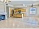 Open-concept living room and kitchen with hardwood floors and natural light at 2461 E Binner Dr, Chandler, AZ 85225