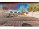 Backyard featuring a fire pit area with chairs for outdoor enjoyment and gatherings at 2738 E Silversmith Trl, San Tan Valley, AZ 85143
