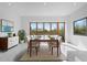 Bright dining area with ample natural light and views offers a welcoming space for meals and gatherings at 28341 N 112Th Way, Scottsdale, AZ 85262