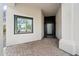 Entryway featuring a dark door with sleek, modern design at 28341 N 112Th Way, Scottsdale, AZ 85262