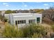 Stunning aerial view of a modern luxury home with desert landscaping and stunning views at 28341 N 112Th Way, Scottsdale, AZ 85262