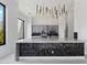 Stylish kitchen with a large island, modern pendant lights, and gray cabinets at 28341 N 112Th Way, Scottsdale, AZ 85262