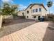 Expansive backyard with brick patio and rock landscaping perfect for outdoor enjoyment at 3134 E Mckellips Rd # 50, Mesa, AZ 85213