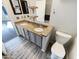 Stylish bathroom featuring granite counters, dual sinks, updated fixtures, and tiled floors at 3134 E Mckellips Rd # 50, Mesa, AZ 85213