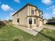 Two-story home with lawn and well-maintained landscaping, side entry garage, and architectural details at 3134 E Mckellips Rd # 50, Mesa, AZ 85213