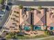 Birds eye view of homes with pools, situated near a golf course and walking trails at 3373 E Sports Dr, Gilbert, AZ 85298