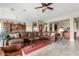 Open-concept living space with a large sectional sofa, connecting seamlessly to the kitchen at 3373 E Sports Dr, Gilbert, AZ 85298