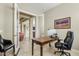 Comfortable home office with a view to the living room at 3373 E Sports Dr, Gilbert, AZ 85298