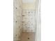 Tiled shower stall features a tile surround, corner shelves, and showerhead at 3373 E Sports Dr, Gilbert, AZ 85298