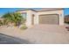 Charming single-Gathering home featuring a well-maintained yard and a two-car garage at 36169 N Serrano Ave, Queen Creek, AZ 85140