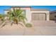 Charming single-Gathering home featuring a well-maintained yard and a two-car garage at 36169 N Serrano Ave, Queen Creek, AZ 85140