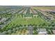 Expansive community aerial of homes surrounding a park, offering a serene living environment at 3859 E Appaloosa Rd, Gilbert, AZ 85296