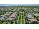 Picturesque aerial view of a planned community featuring landscaped streets and desert landscape at 3859 E Appaloosa Rd, Gilbert, AZ 85296