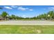 Outdoor basketball court with well-maintained court and green surroundings for community recreation at 3859 E Appaloosa Rd, Gilbert, AZ 85296