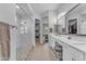 Spacious bathroom with glass shower, dual sinks, and adjacent bedroom view at 3859 E Appaloosa Rd, Gilbert, AZ 85296