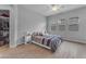 Comfortable bedroom with ample natural light, a ceiling fan and a walk-in closet at 3859 E Appaloosa Rd, Gilbert, AZ 85296