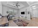 Bright room with modern ceiling fan, stylish decor, and wood-look flooring at 3859 E Appaloosa Rd, Gilbert, AZ 85296
