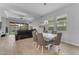 Bright dining area adjacent to a modern living room at 3859 E Appaloosa Rd, Gilbert, AZ 85296