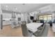 Spacious dining area adjacent to a gourmet kitchen and a relaxing living room at 3859 E Appaloosa Rd, Gilbert, AZ 85296