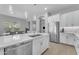 Open kitchen featuring stainless steel appliances, ample counter space, and seamless flow to dining area at 3859 E Appaloosa Rd, Gilbert, AZ 85296