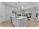 Well-lit kitchen with modern appliances flows seamlessly to the dining and living areas at 3859 E Appaloosa Rd, Gilbert, AZ 85296