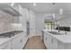 Bright, open kitchen with stainless steel appliances, a gas cooktop and a kitchen island at 3859 E Appaloosa Rd, Gilbert, AZ 85296