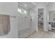 Frameless glass shower featuring decorative tile, built-in niche, and high end shower head at 3859 E Appaloosa Rd, Gilbert, AZ 85296
