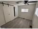 Clean and simple bedroom with a ceiling fan, ample closet space, and a neutral color scheme, perfect for rest at 4065 E University Dr # 88, Mesa, AZ 85205