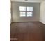 Empty bedroom with neutral carpet, window and white walls at 4077 S Sabrina Dr # 94, Chandler, AZ 85248