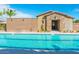 Community pool with a restroom and landscaping at 4077 S Sabrina Dr # 94, Chandler, AZ 85248